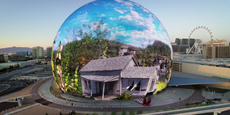 “Crowd at the Las Vegas Sphere enjoying immersive Wizard of Oz showing with wind and visual effects.”